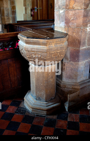 The font, St. Mary`s Church, Wappenham, Northamptonshire, England, UK Stock Photo